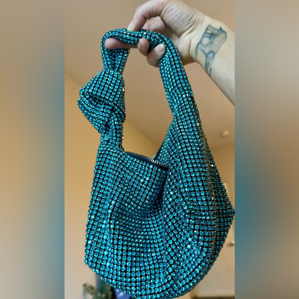 Bling bling bag. Sparkles a lot at night and under lights